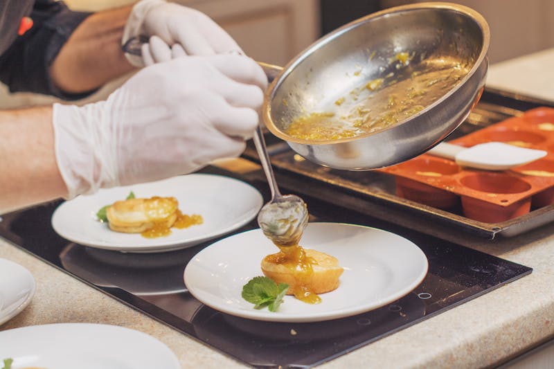 Pastry chef crafting desserts at Cafe Rio